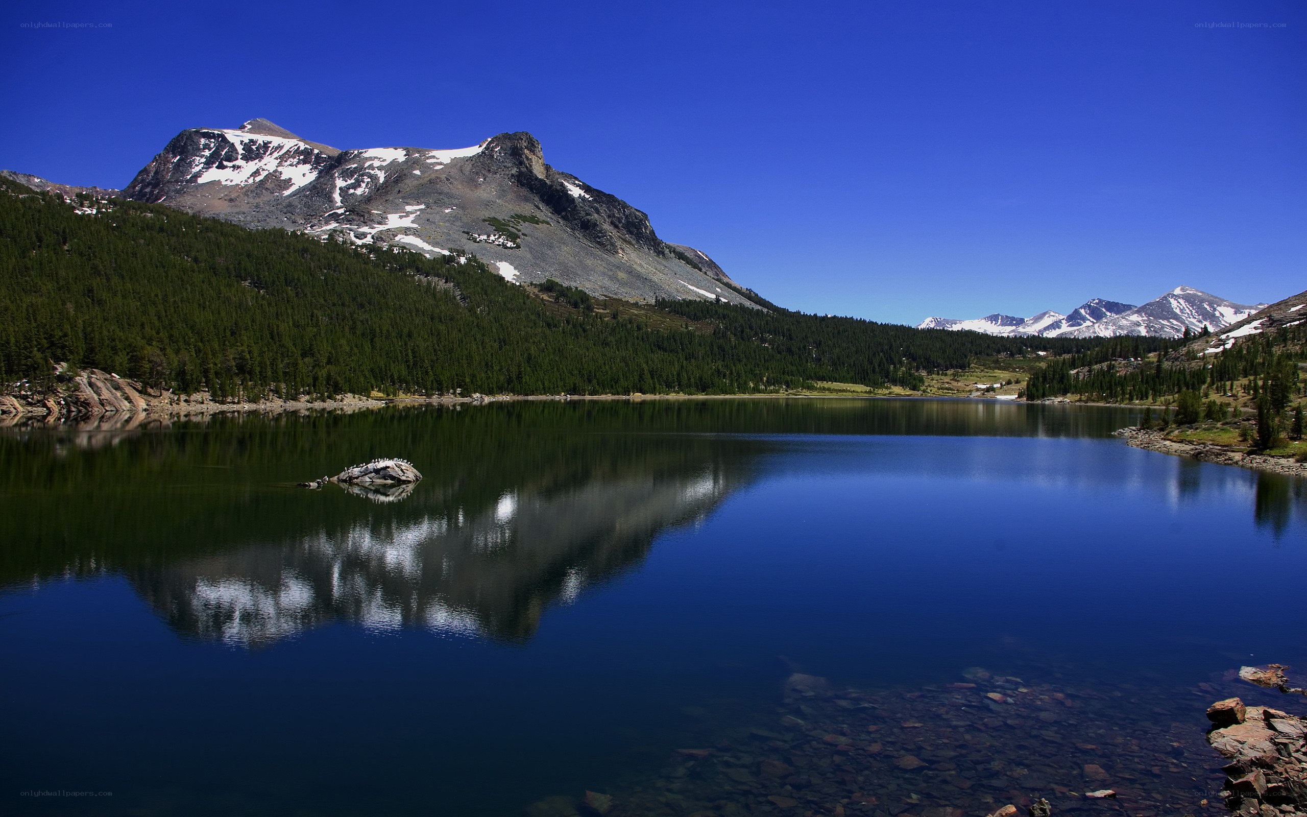 Mountain lake with snow-capped peaks