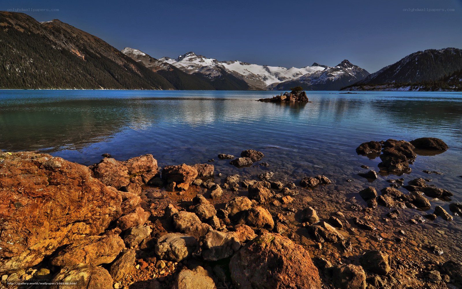 Mountain lake with snow-capped peaks