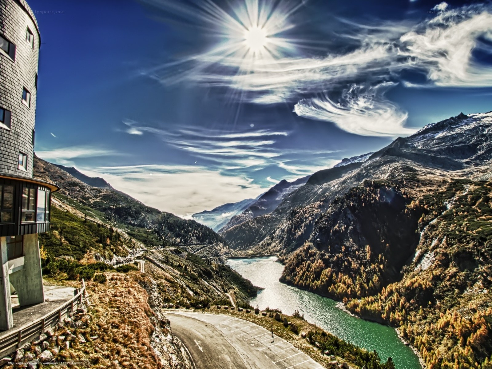 Mountain lake with sunburst