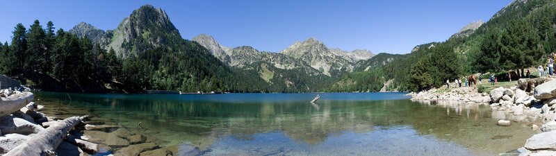 Mountain Lake with Trees — Blue, Serene, Afternoon, Photograph, Mountains, People