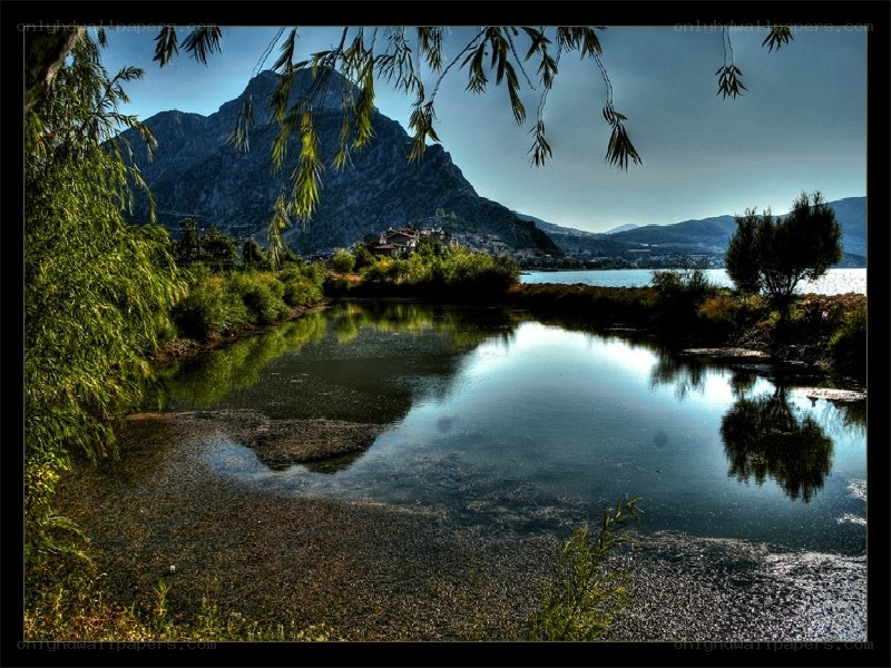 Mountain lake with village view