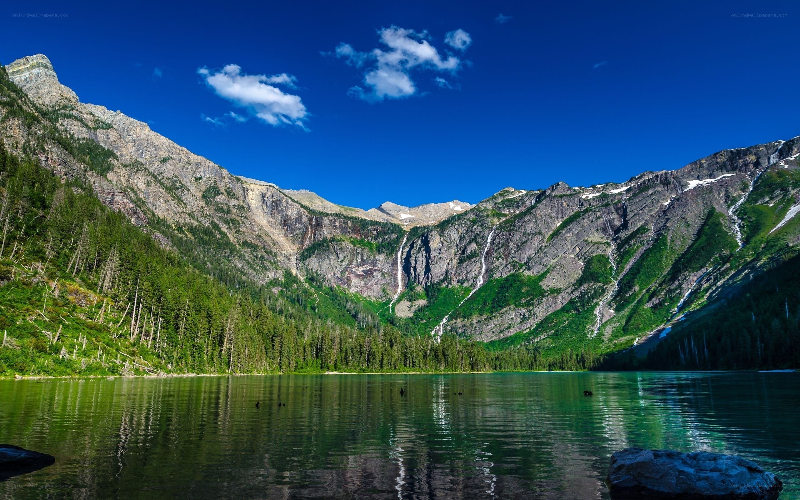 Mountain lake with waterfalls
