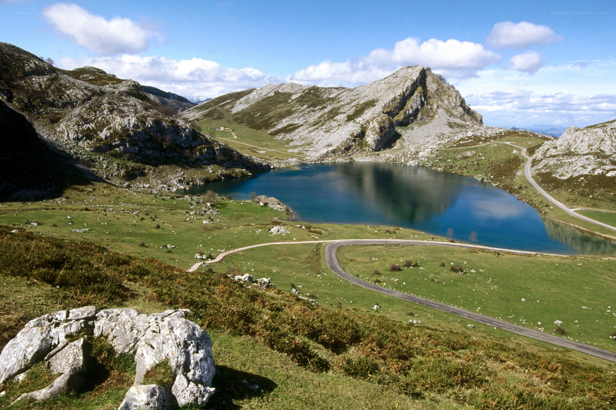 Mountain lake with winding road