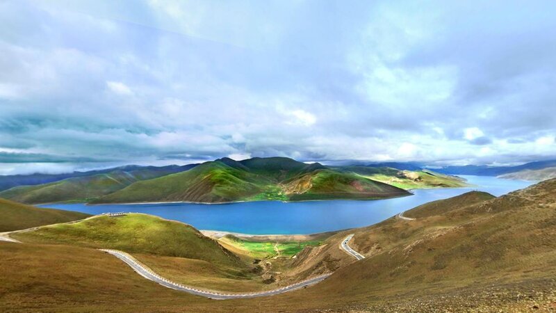 Mountain lake with winding road