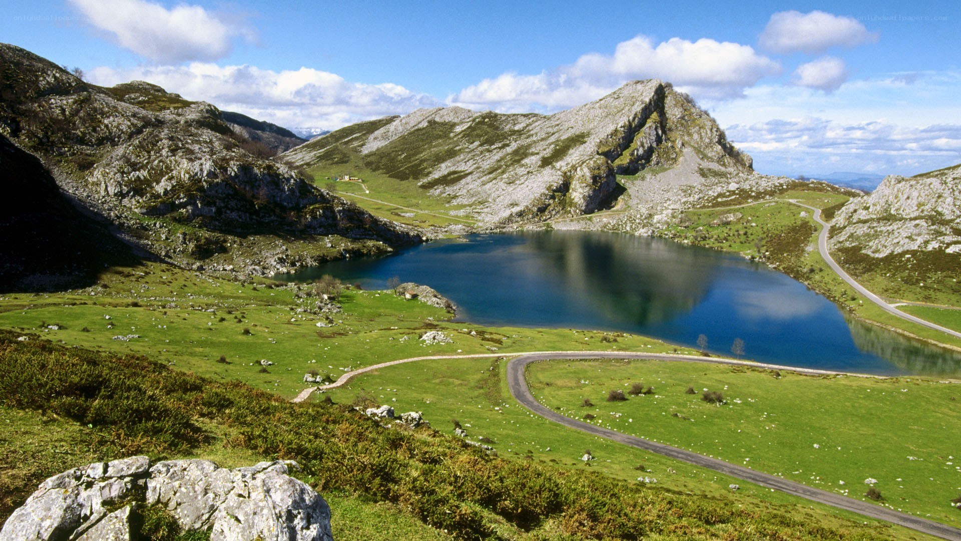 Mountain lake with winding road