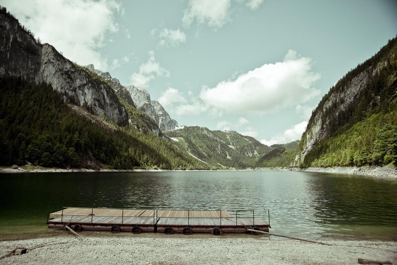 Mountain lake with wooden dock