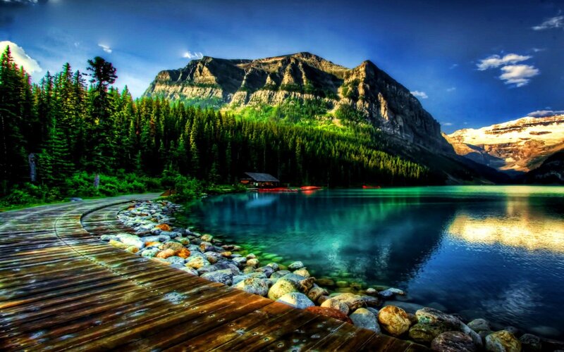 Mountain lake with wooden walkway