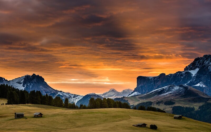 Mountain Landscape at Sunset — Orange, Dramatic, Photograph, Mountains, Huts