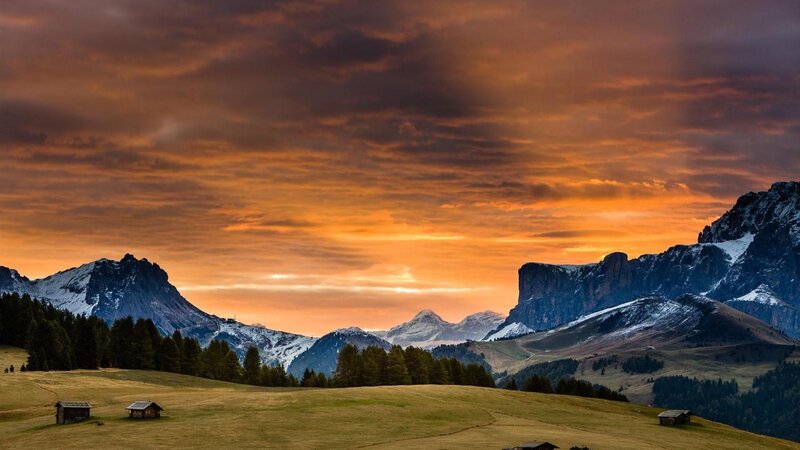 Mountain Landscape at Sunset — Orange, Dramatic, Photograph, Mountains, Huts, Trees