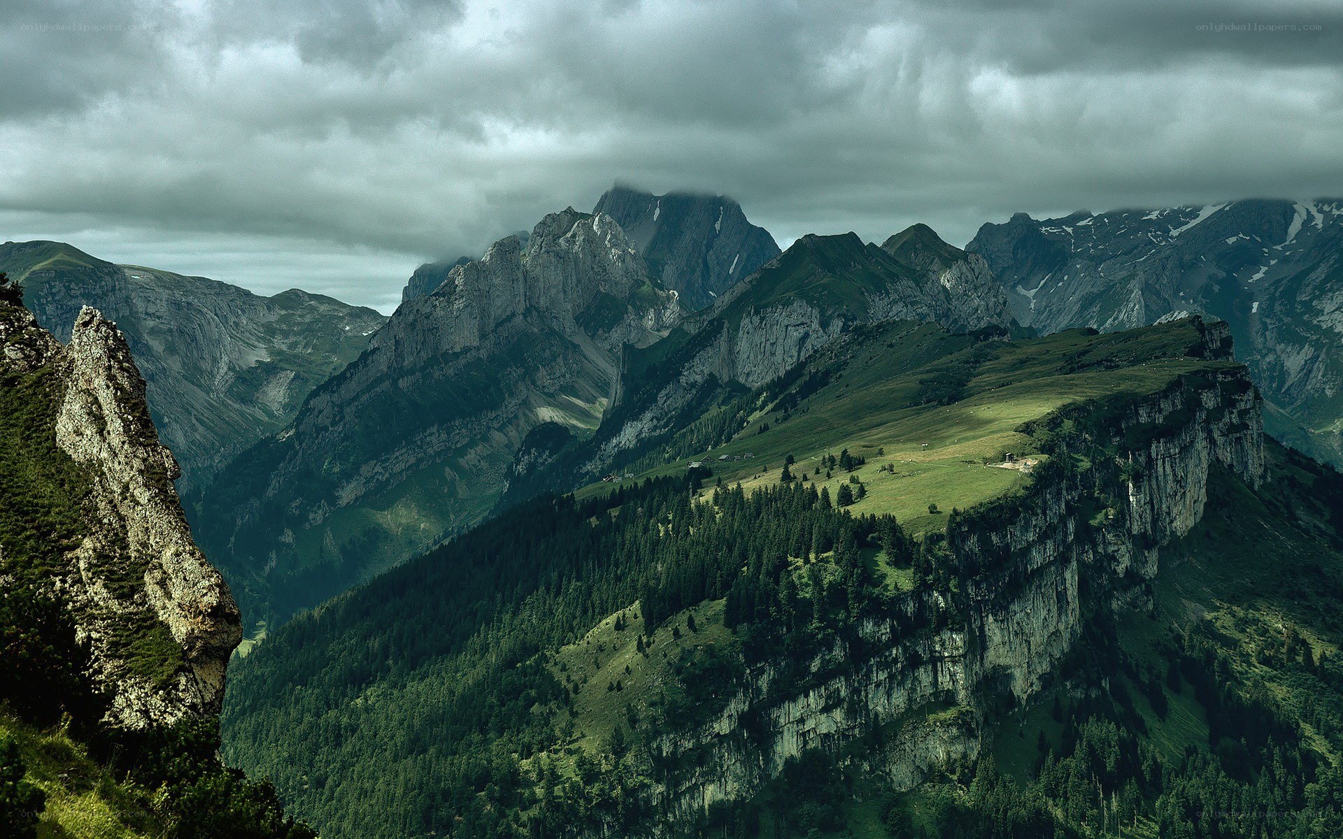 Mountain landscape under cloudy sky
