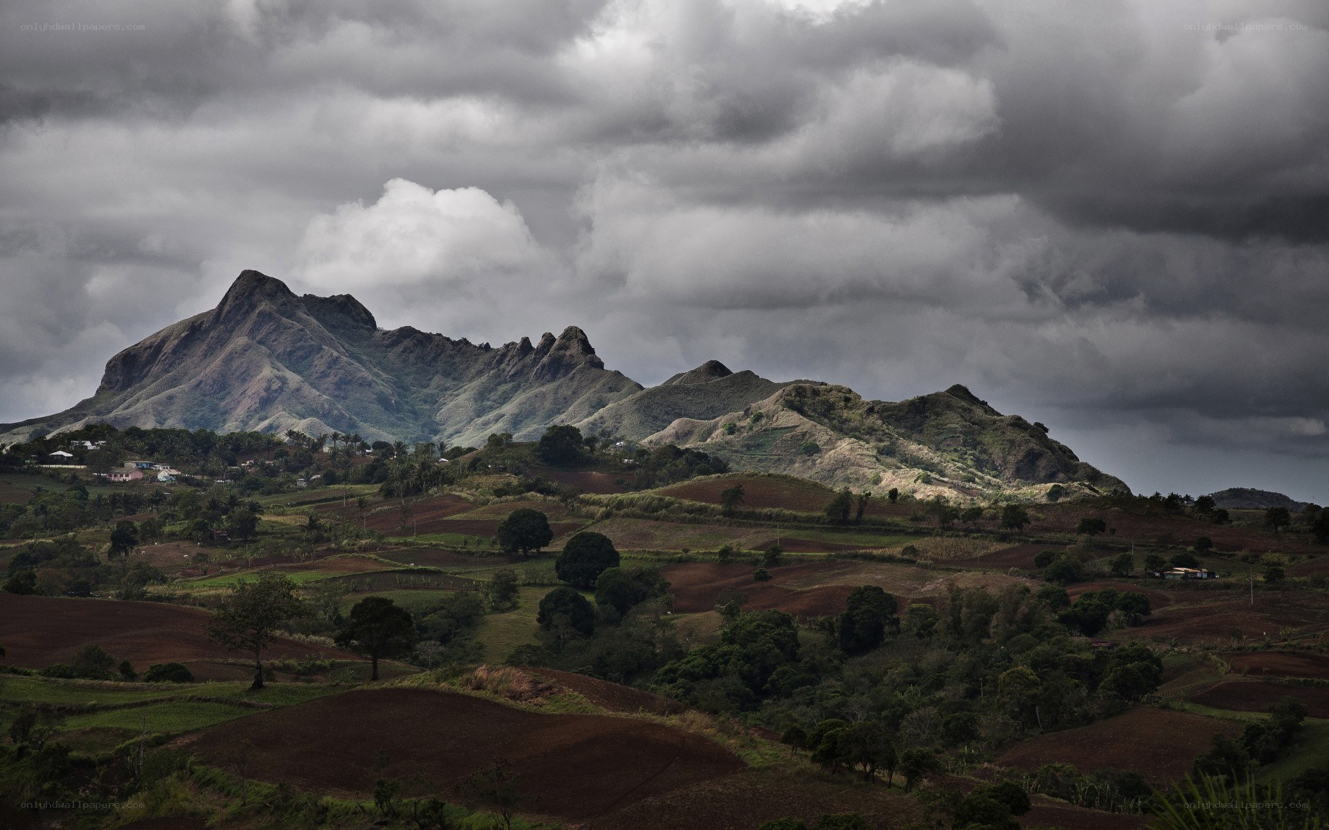 Mountain landscape under cloudy sky