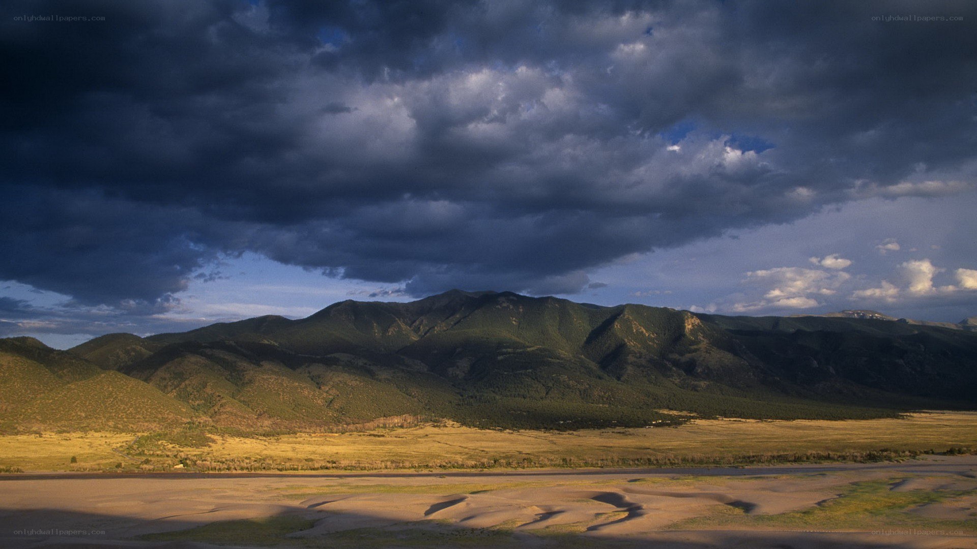 Mountain landscape under stormy sky