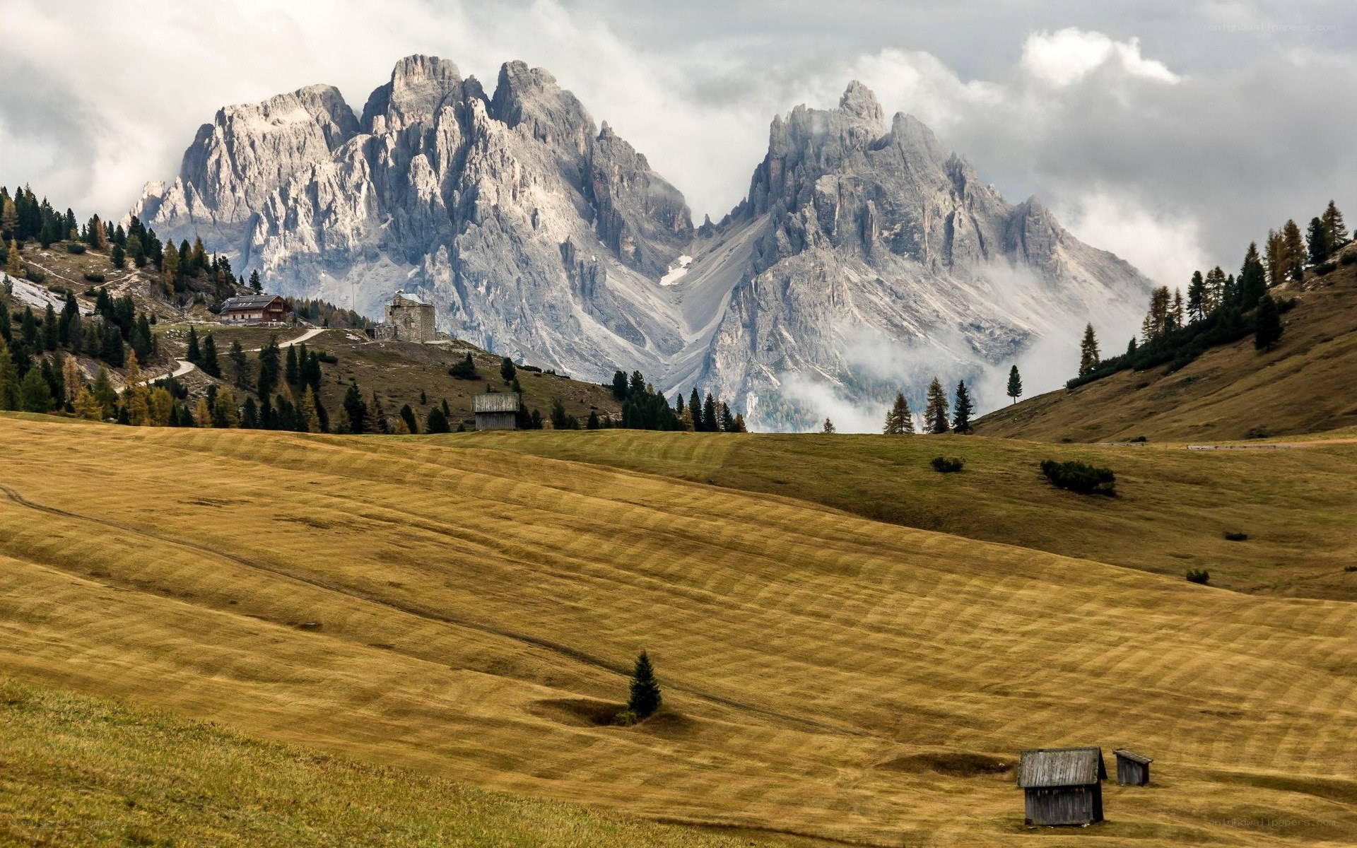 Mountain landscape with alpine huts