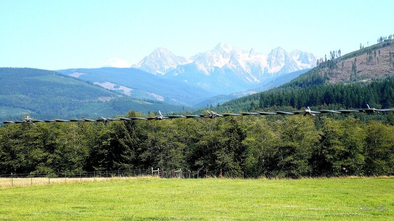Mountain landscape with barbed wire