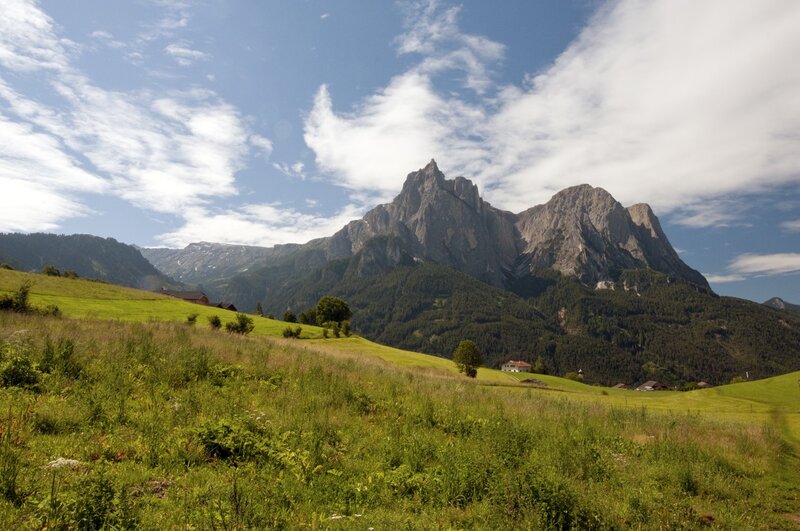 Mountain landscape with green fields