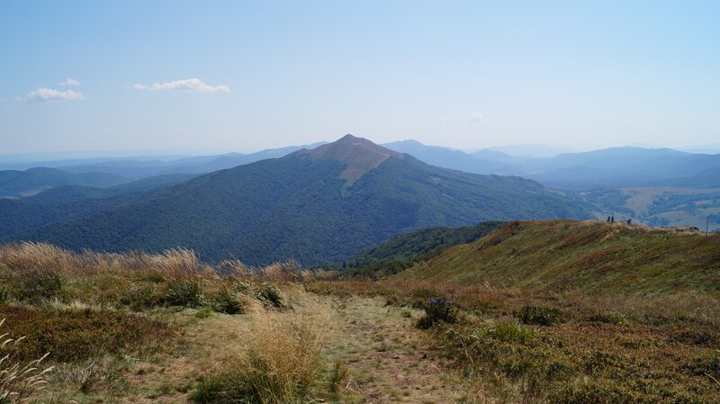 Mountain landscape with hikers