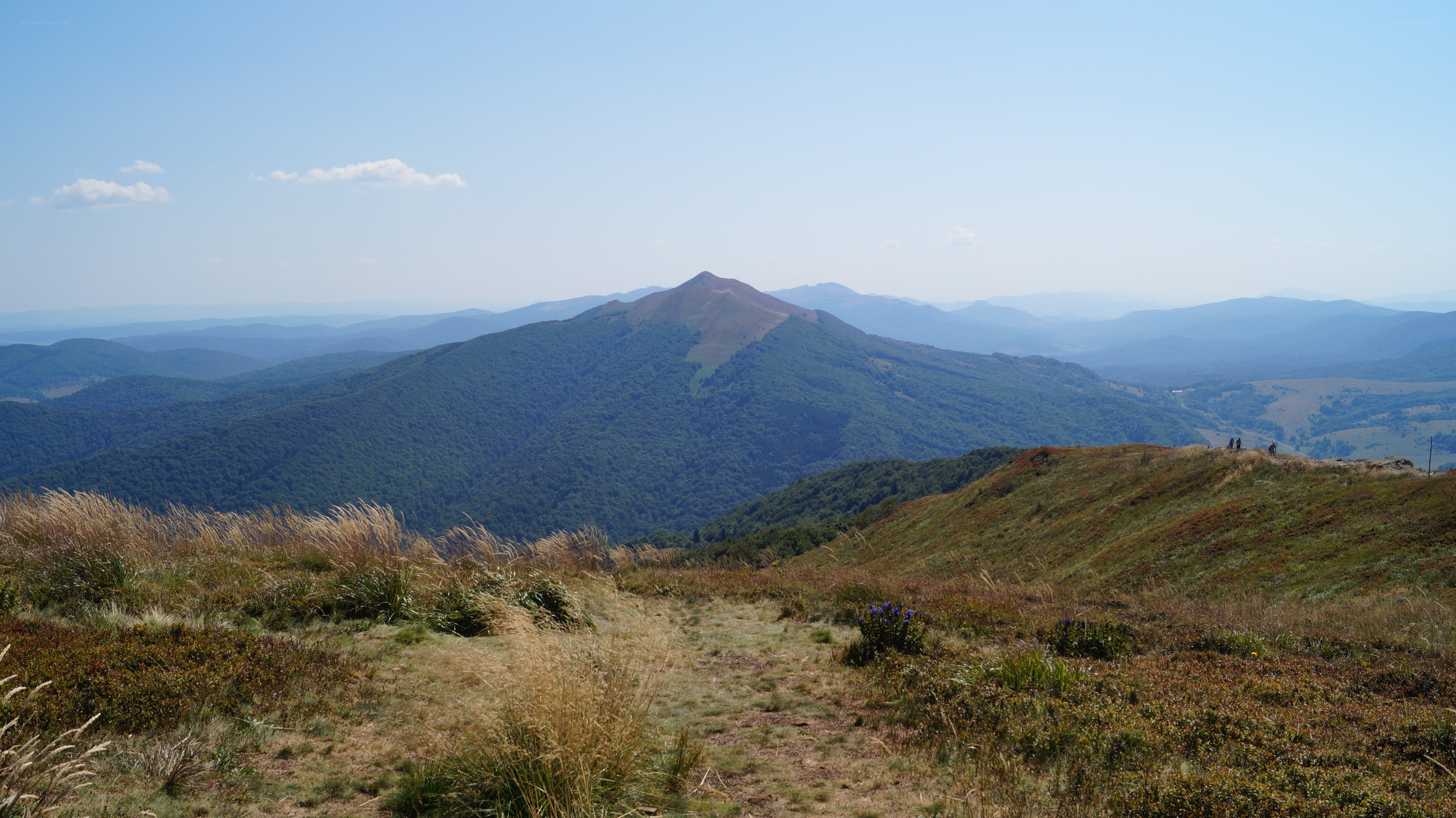 Mountain landscape with hikers