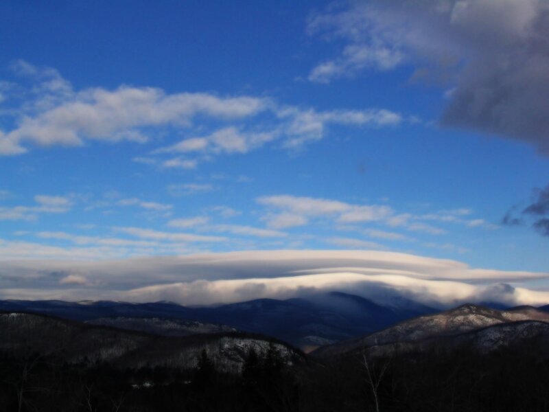 Mountain landscape with lenticular clouds