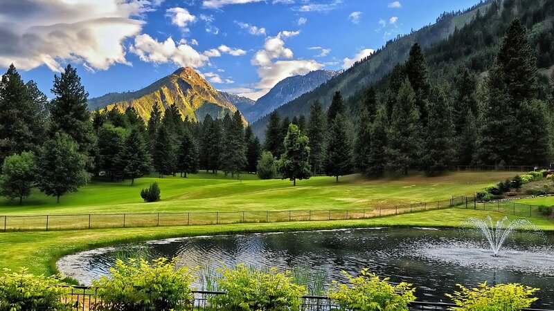 Mountain landscape with pond and fountain