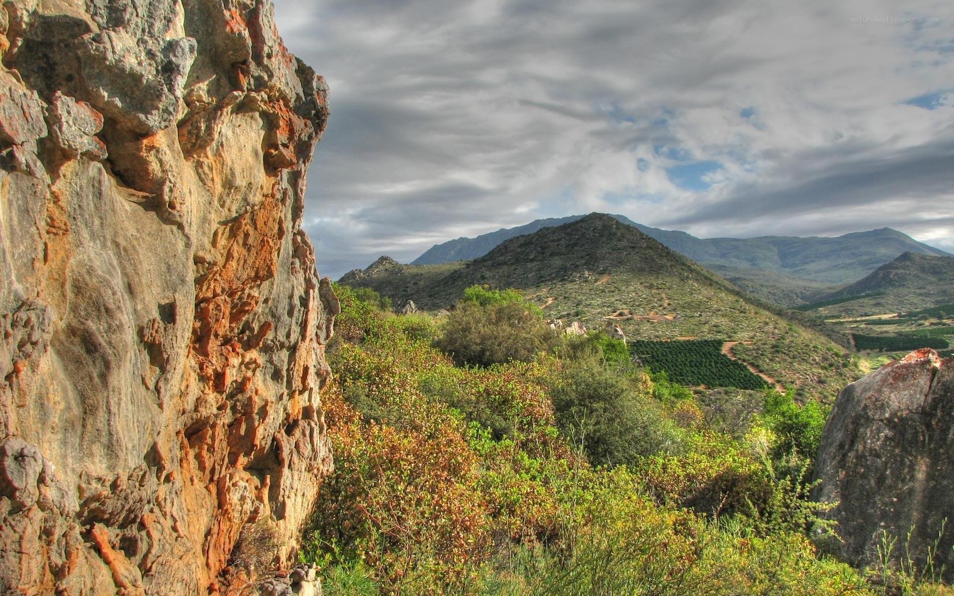 Mountain landscape with rocky cliff