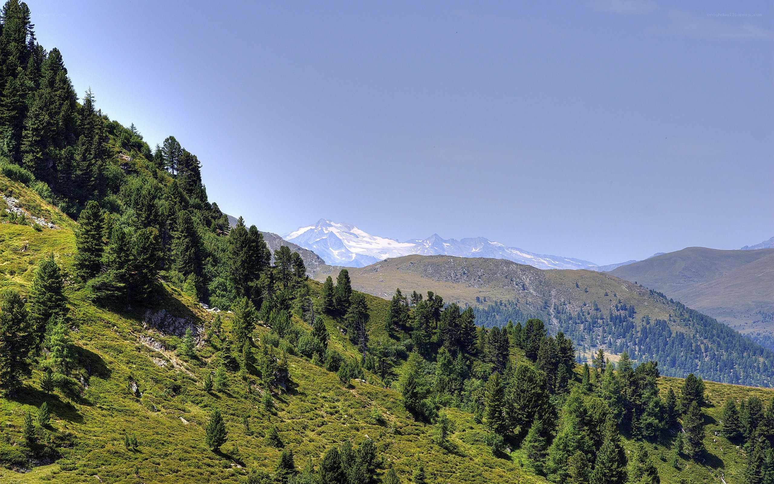 Mountain landscape with snow-capped peak
