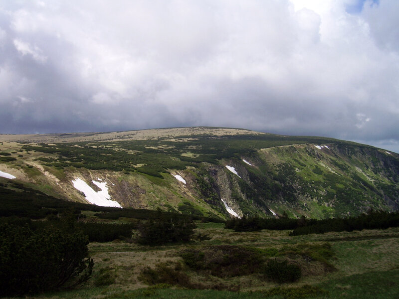mountain landscape with snow patches