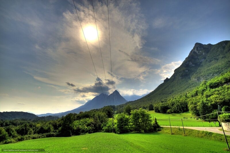 Mountain landscape with sun