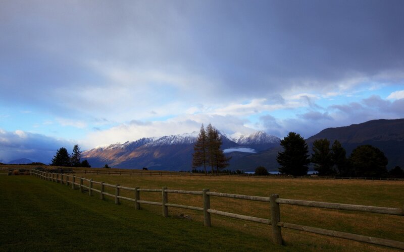Mountain landscape with wooden fence