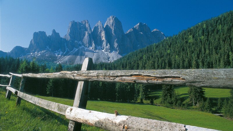 Mountain landscape with wooden fence