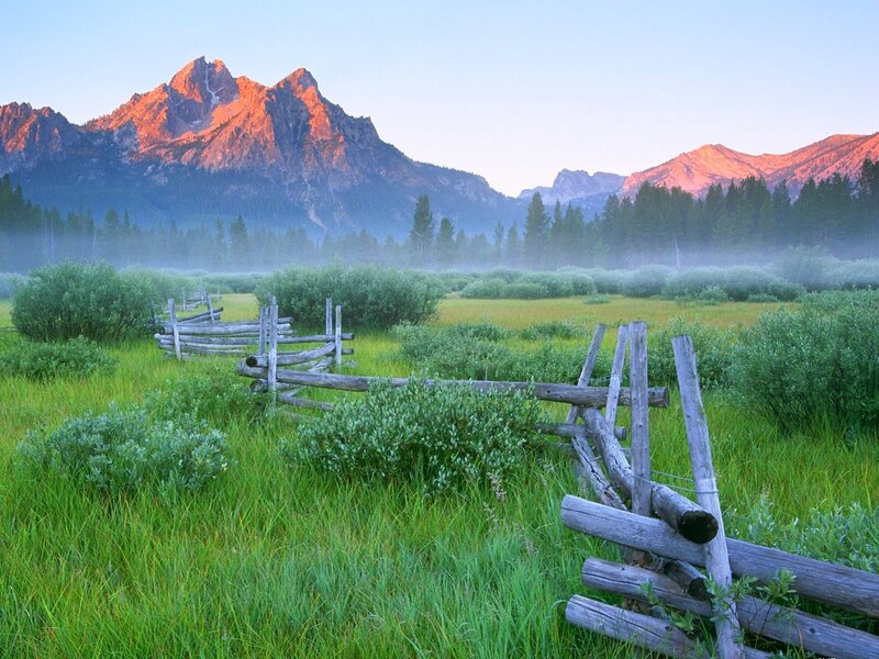 Mountain landscape with wooden fence