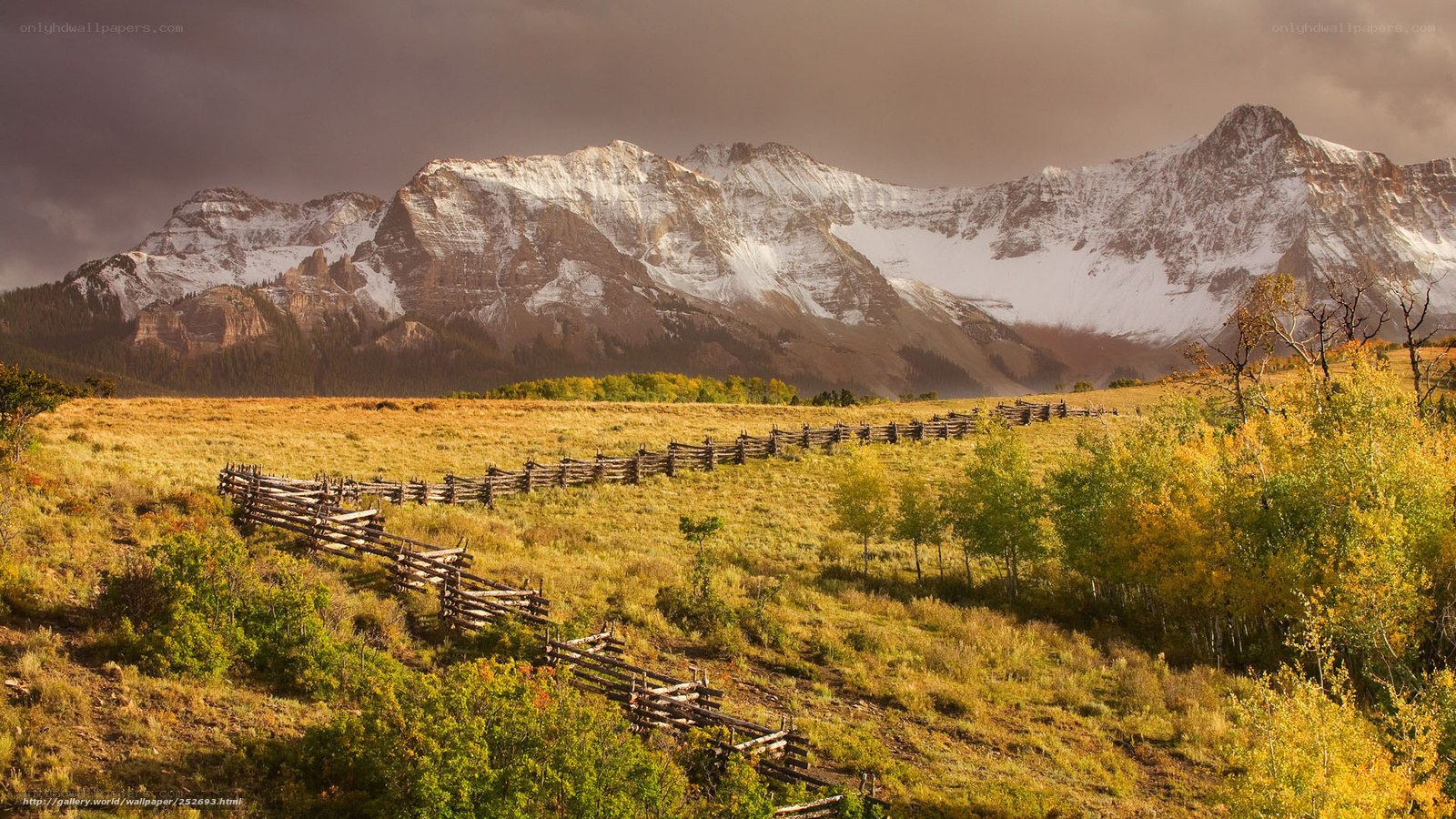 Mountain landscape with wooden fence