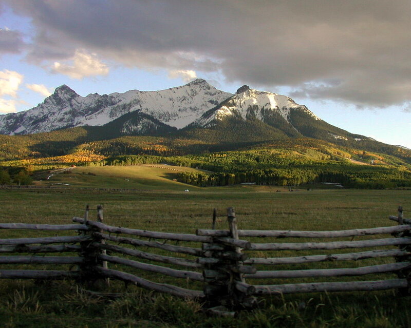 Mountain landscape with wooden fence