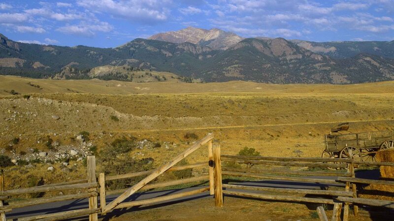 Mountain landscape with wooden fence