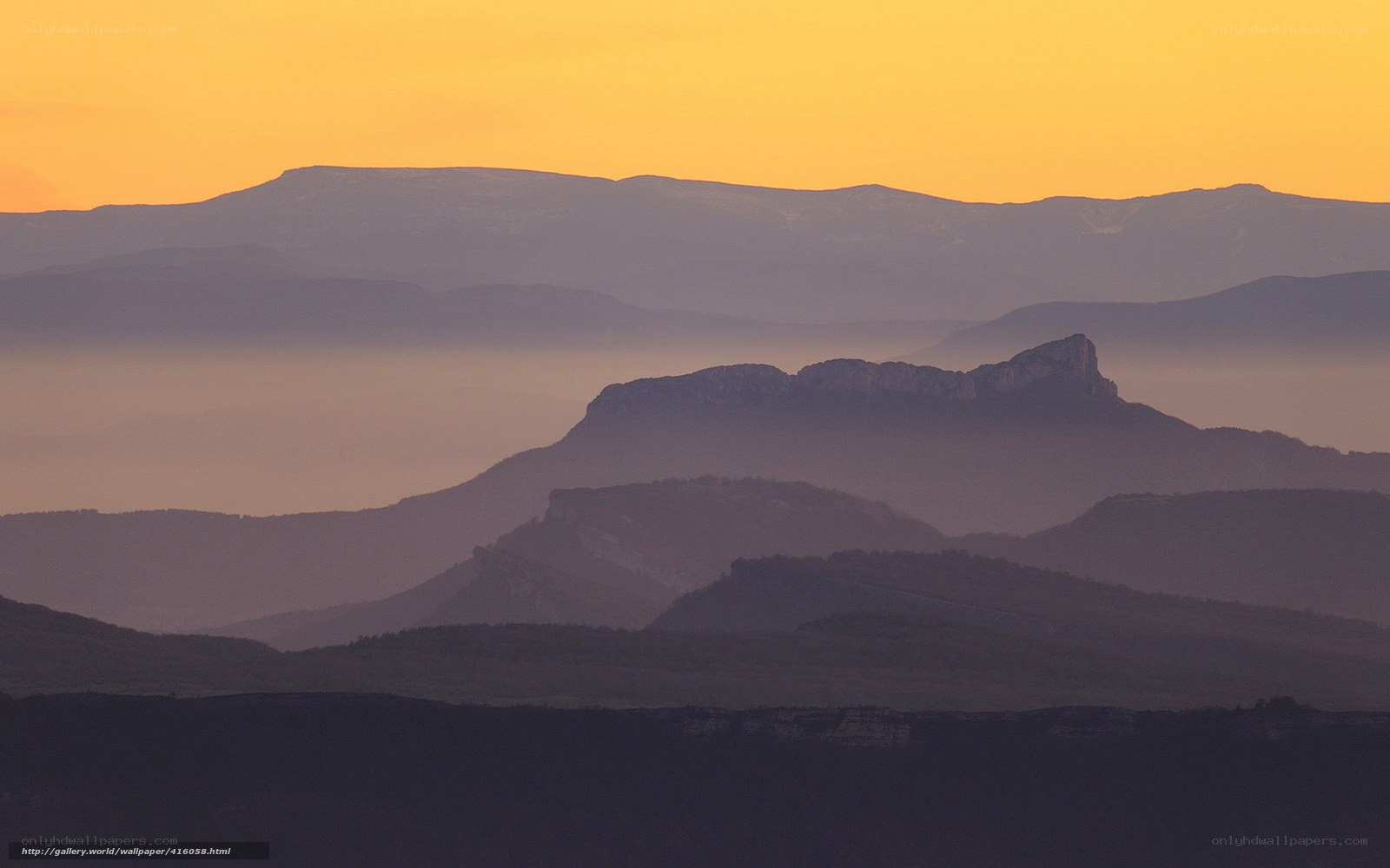Mountain layers at sunrise