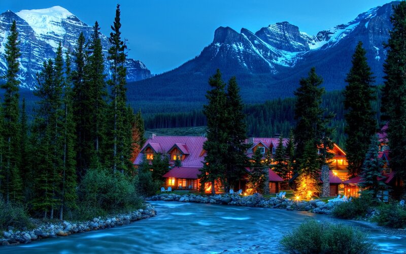 Mountain lodge at dusk