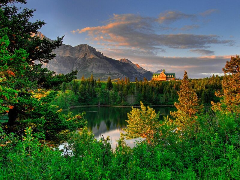 Mountain lodge at sunset