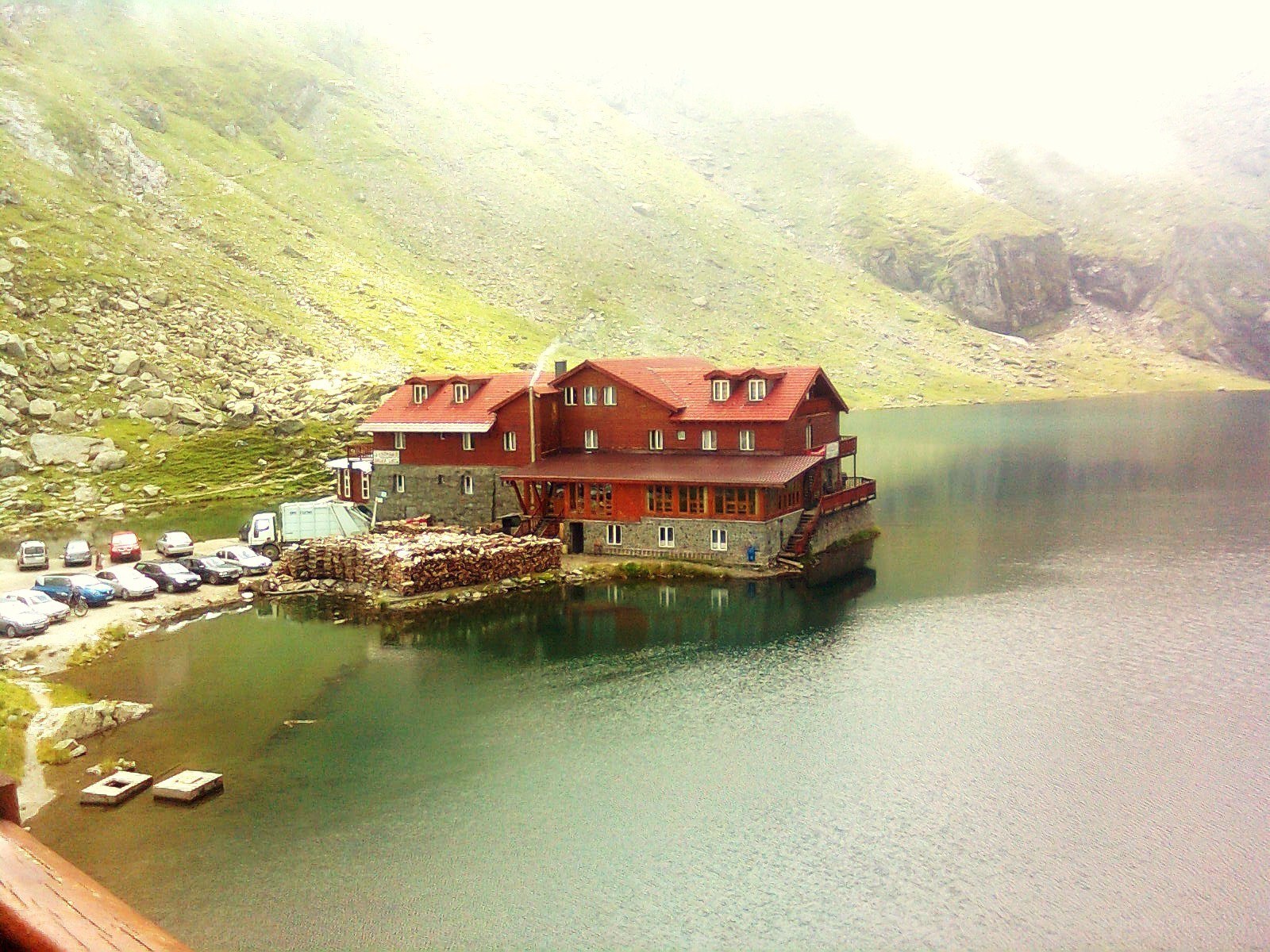 Mountain lodge by a lake