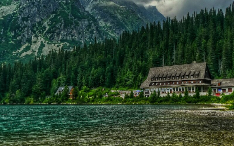 Mountain lodge by a lake