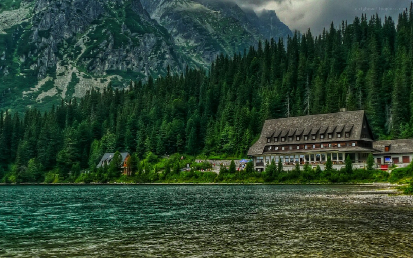 Mountain lodge by a lake