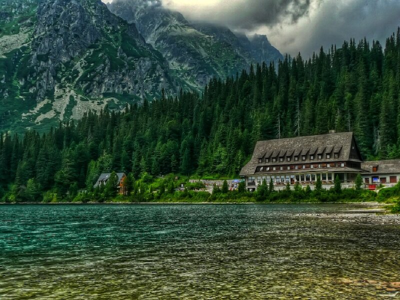 Mountain lodge by a lake