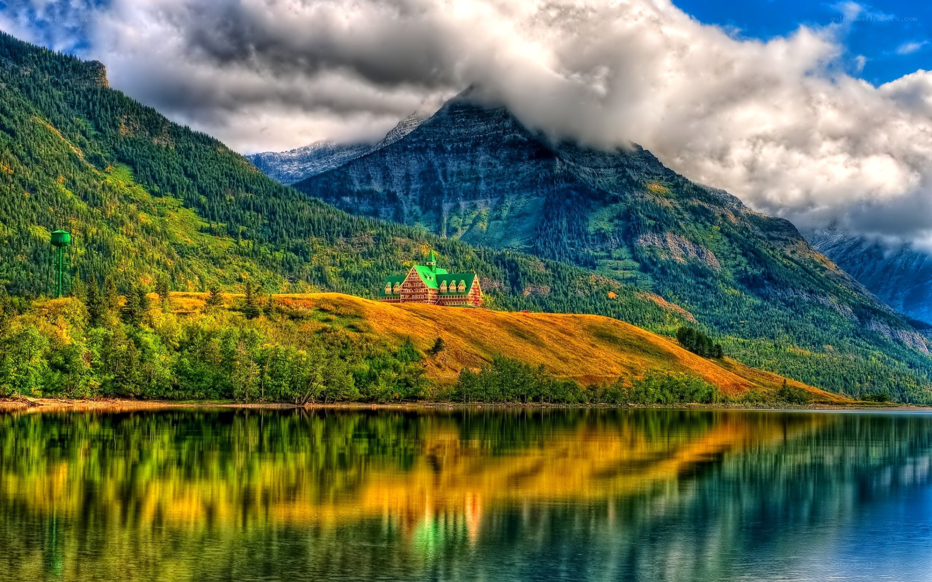 Mountain lodge by a lake