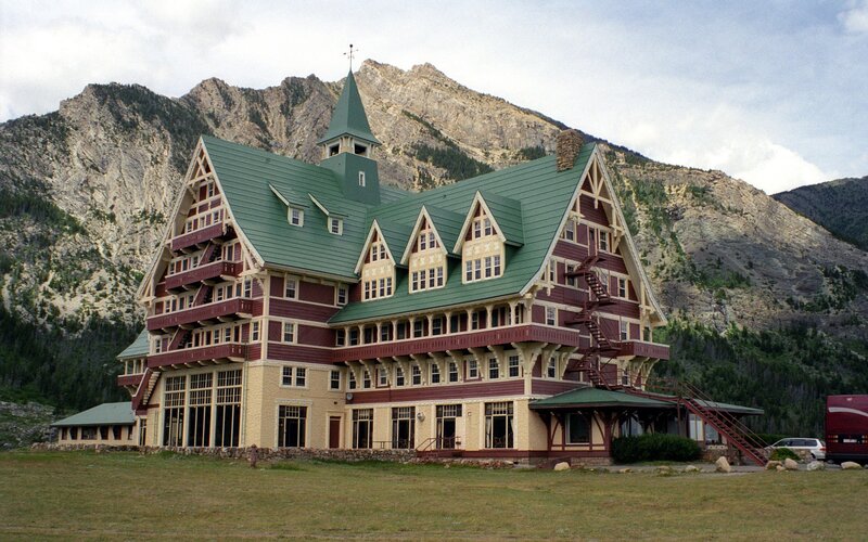 mountain lodge with green roof