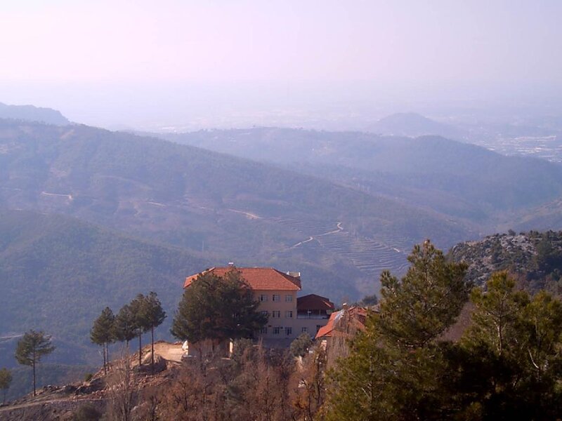 Mountain monastery with terraced hills