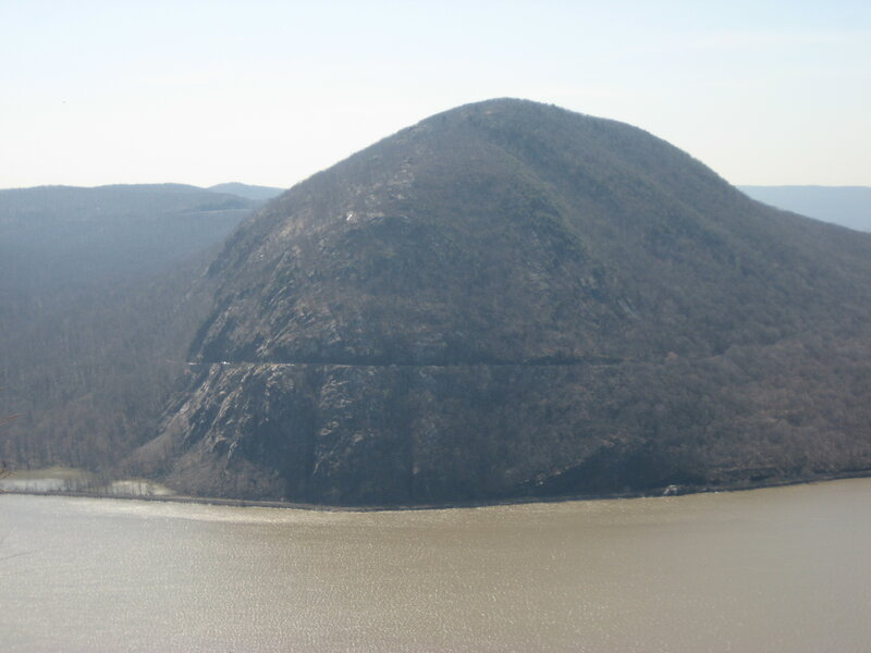 mountain overlooking a river