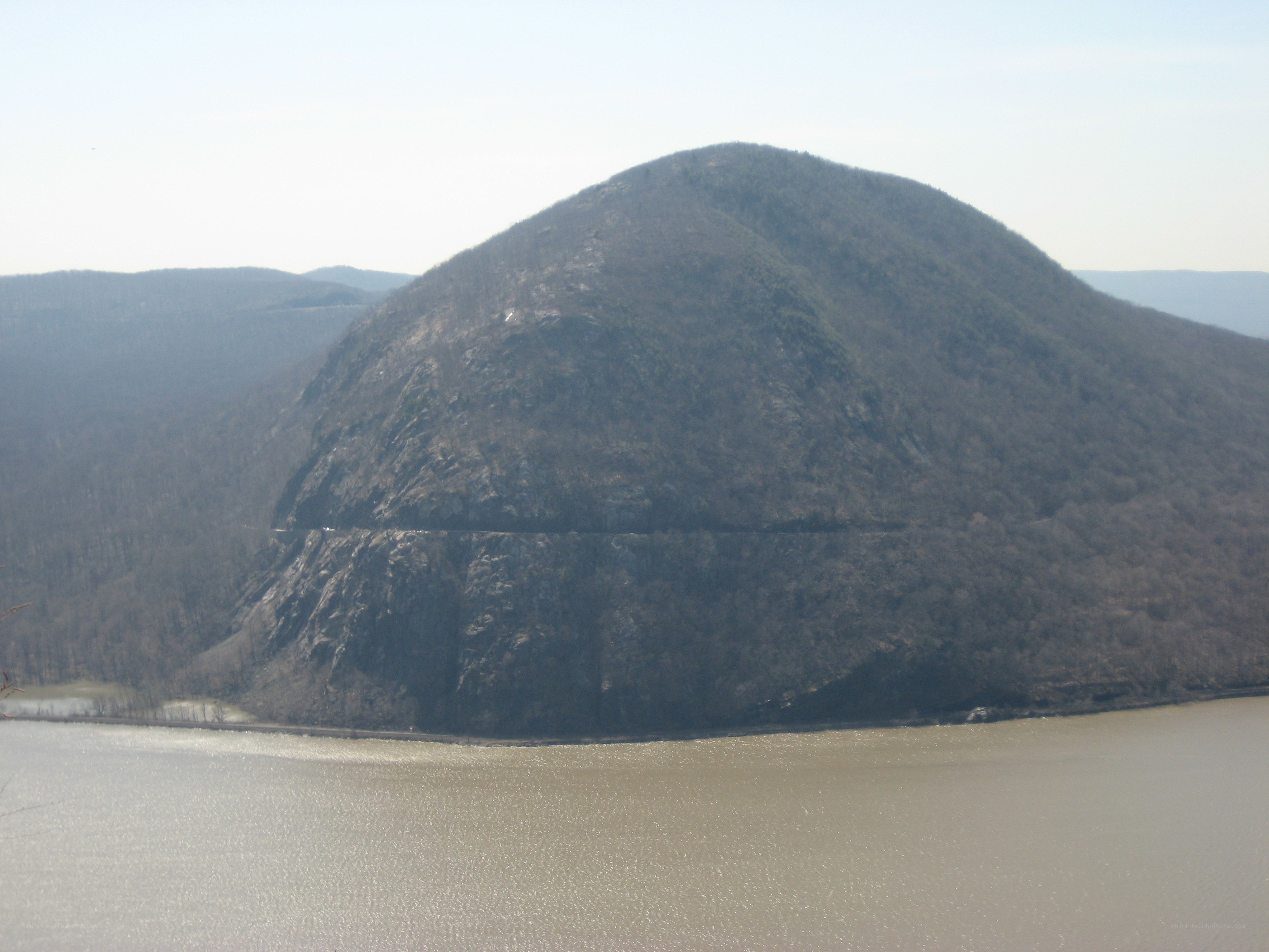 mountain overlooking a river