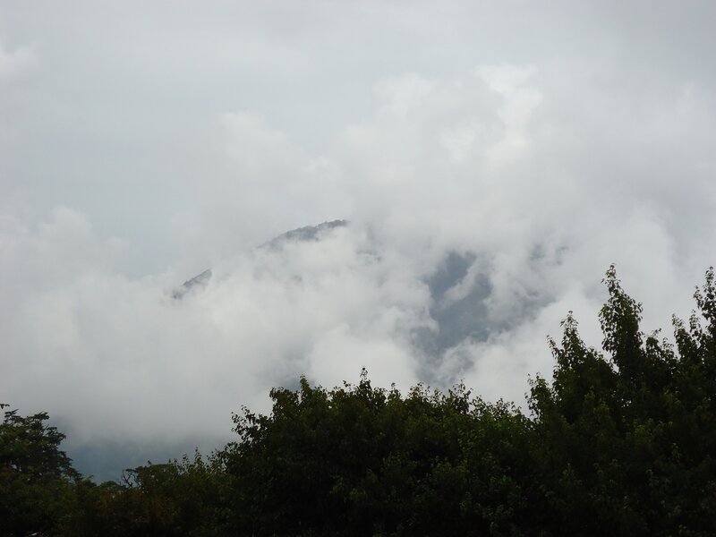 Mountain partially obscured by clouds