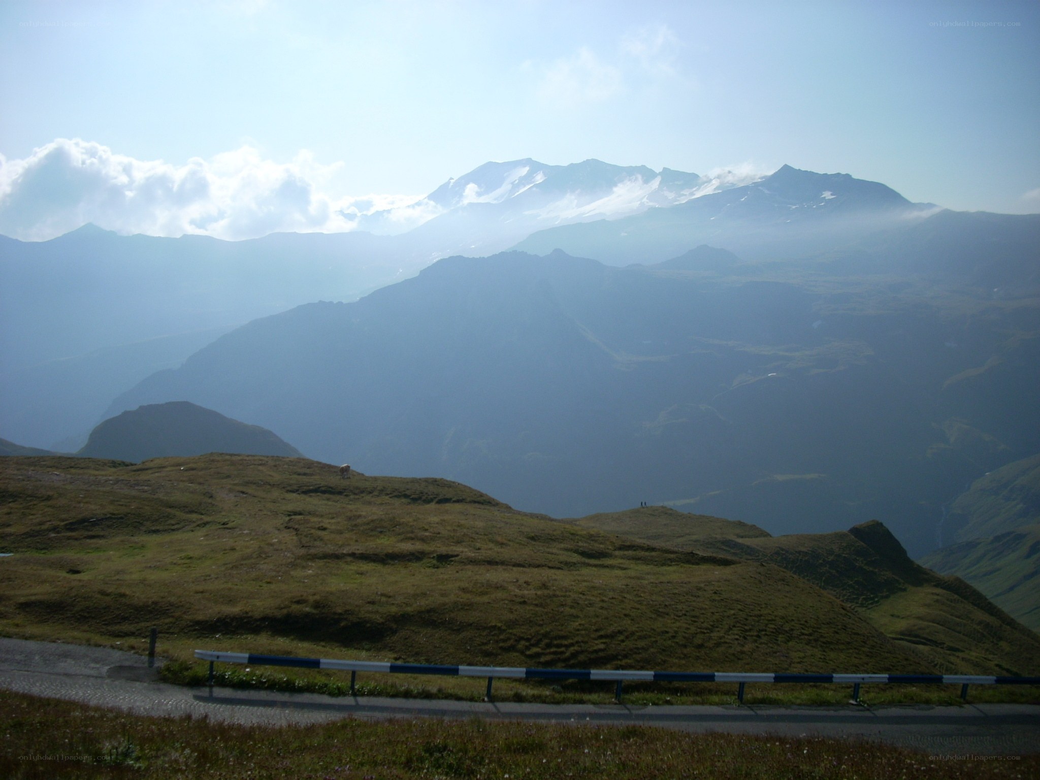 Mountain pass with snow-capped peaks
