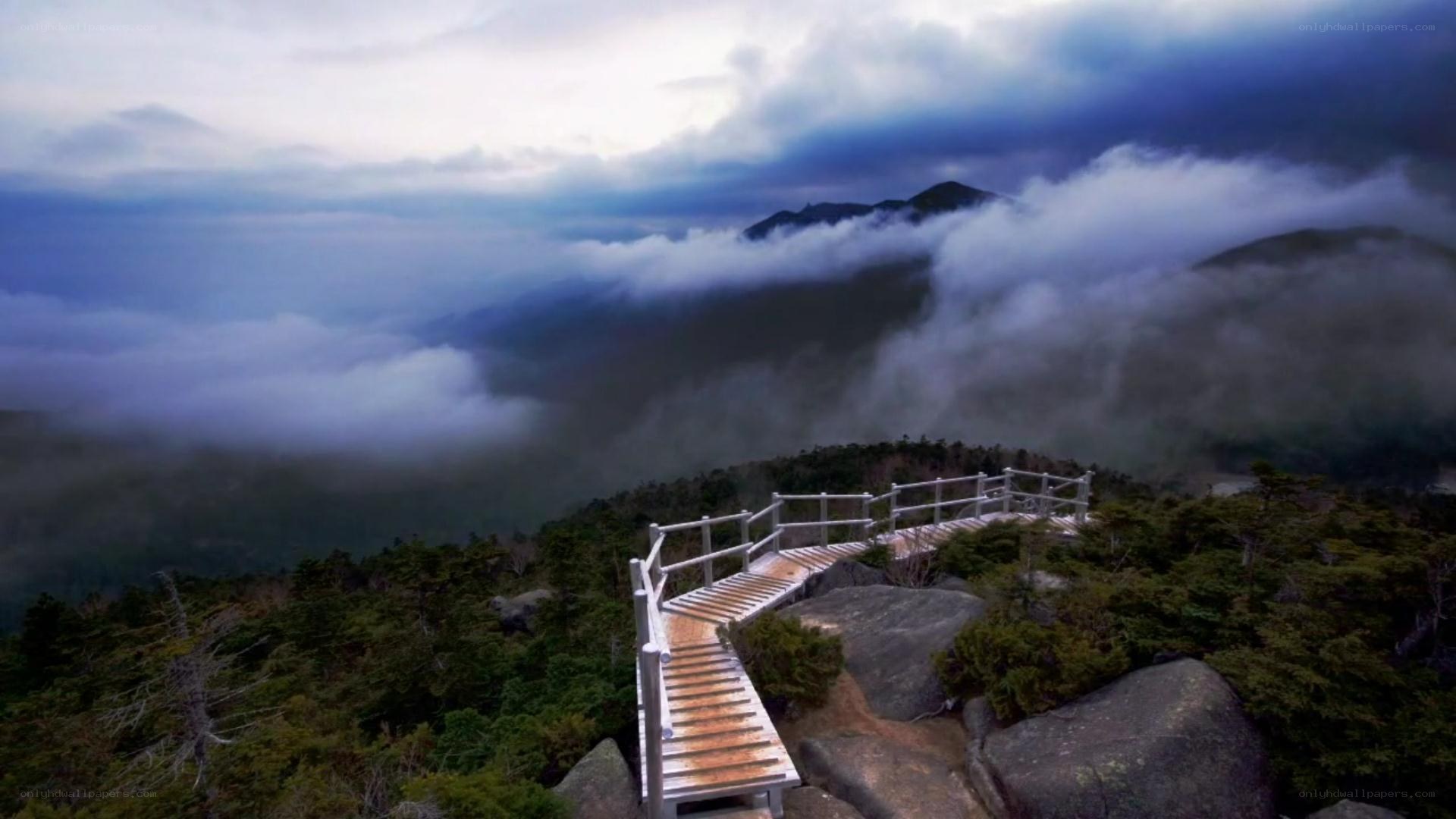 Mountain path above the clouds