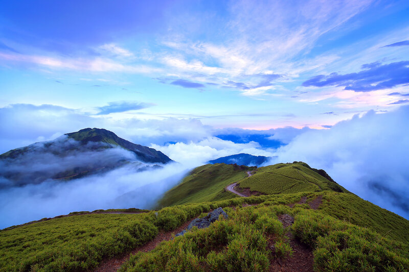 Mountain path above the clouds