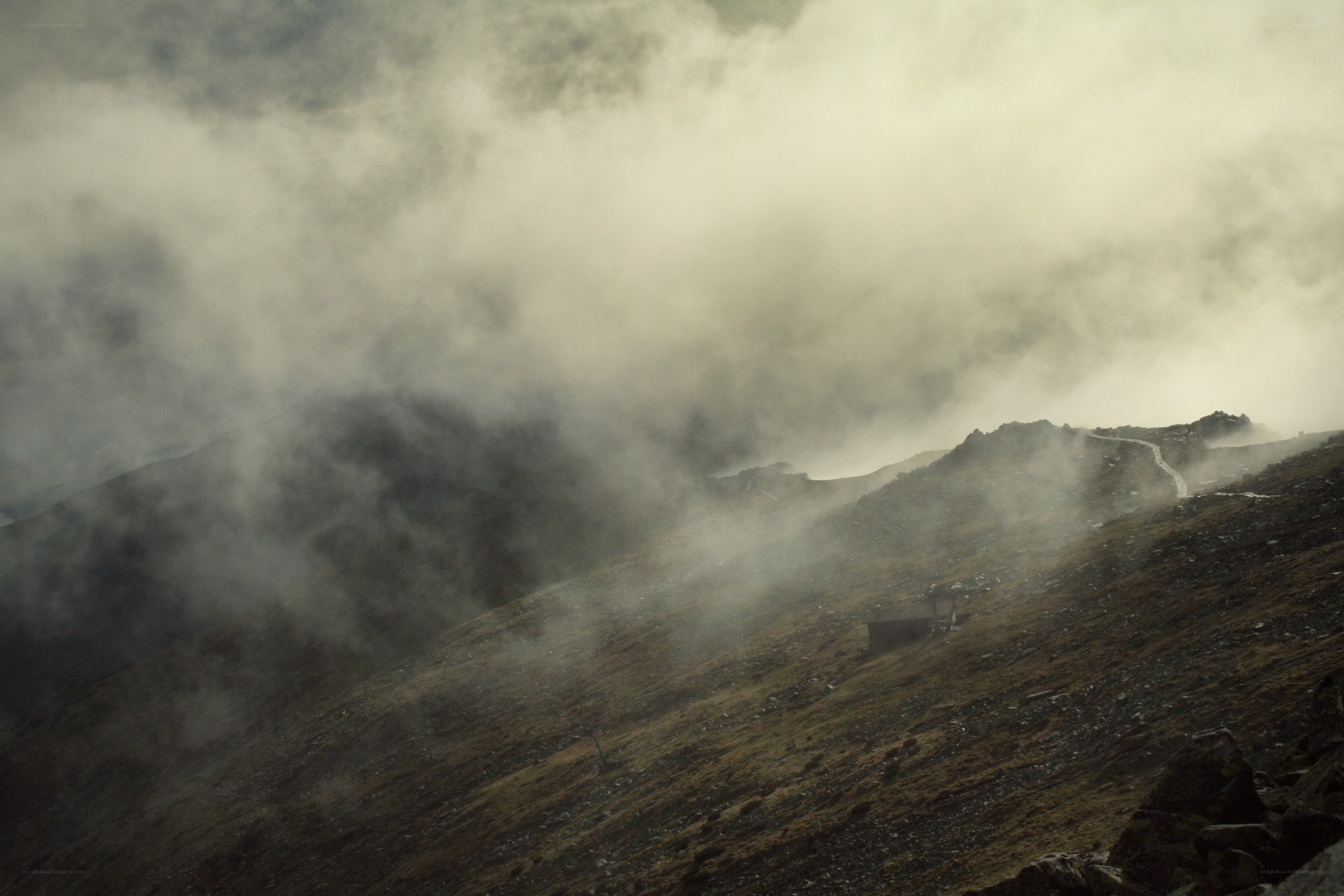 Mountain path in fog